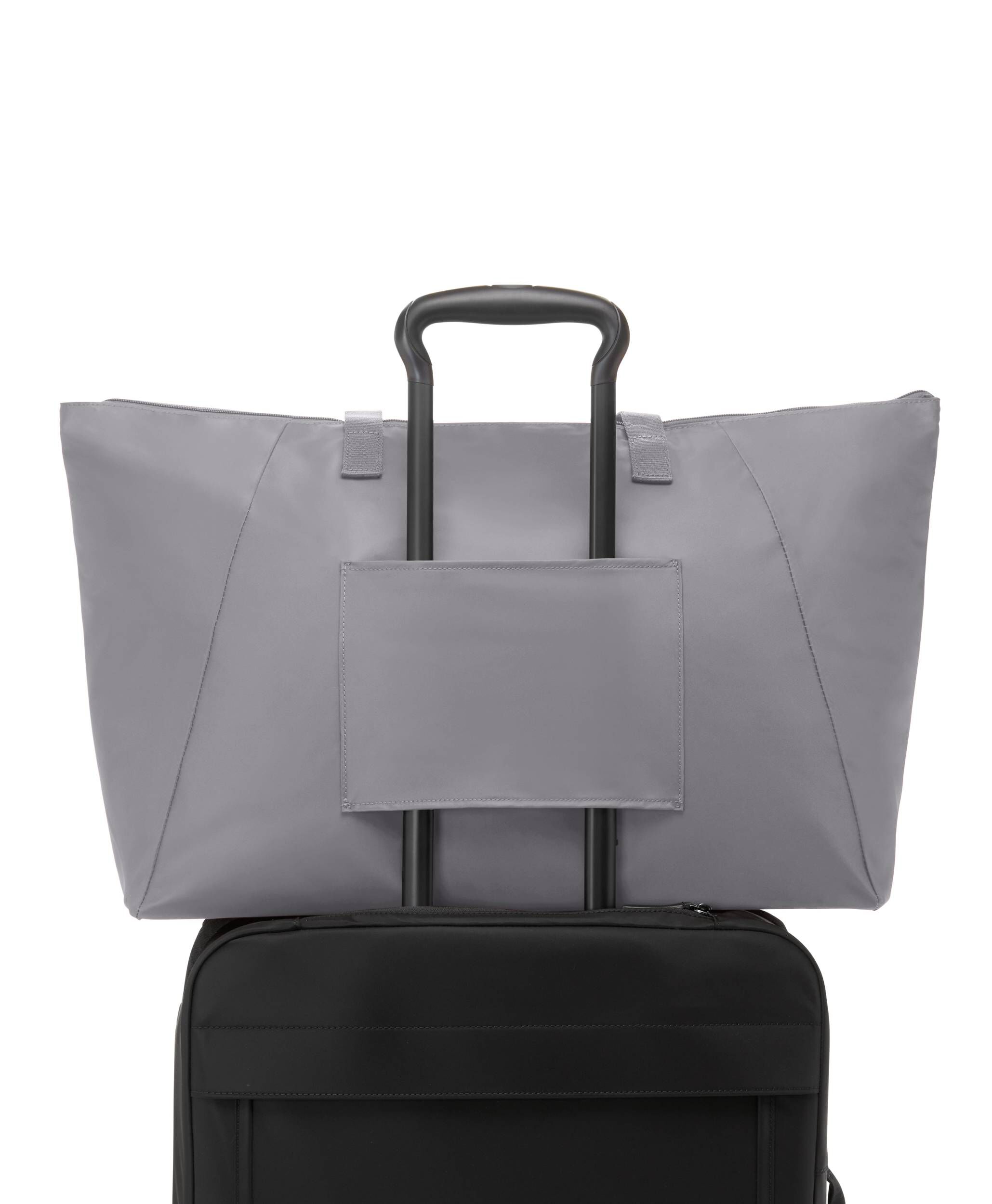 Tumi voyageur sales m tote sale